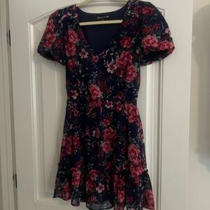 2 dresses that are very similar in style. They are like new!